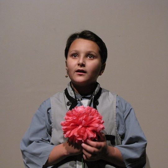 Jordan D'Amico holding flower