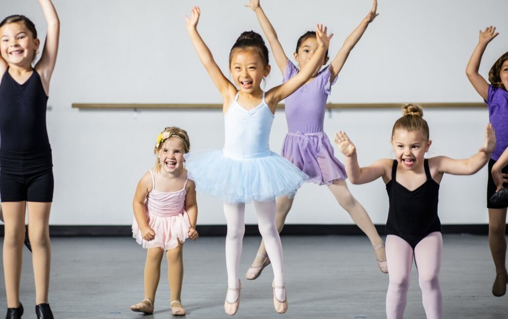 kids in tutus in studio jumping