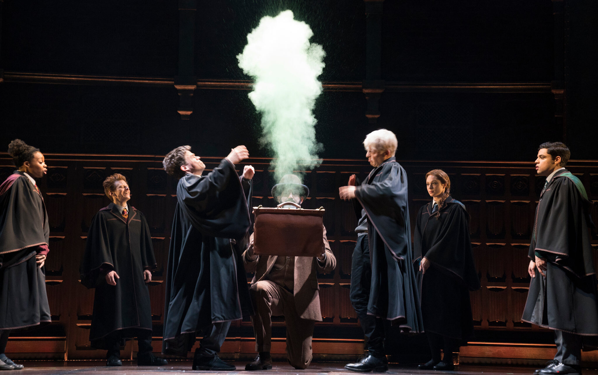 hogwarts students surrounding smoke
