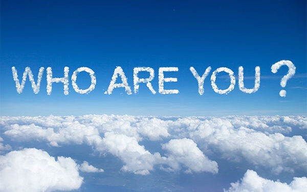 the words "who are you?" over clouds in the sky