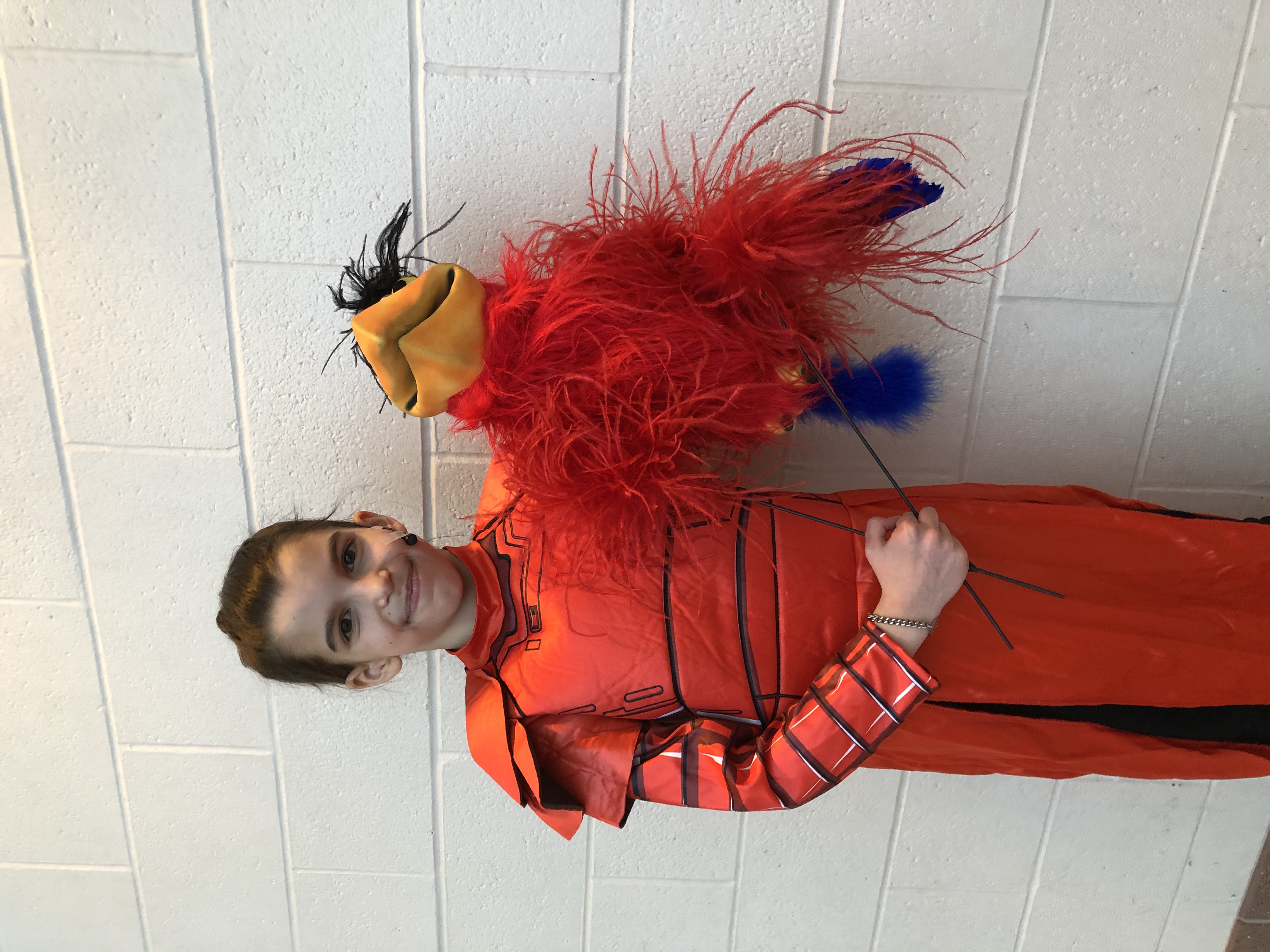 charlotte holding puppet backstage Aladdin