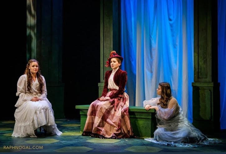 julianne bisnaire cast on stage sitting dresses